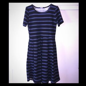Never worn.  Lularoe Amelia dress